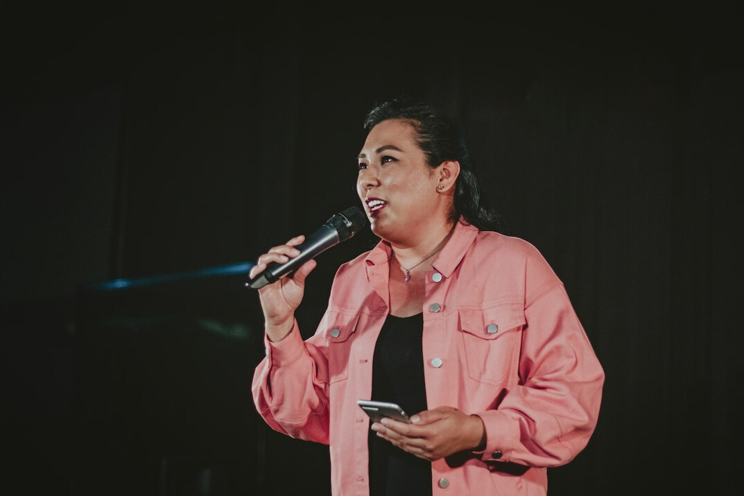 woman singing in studio